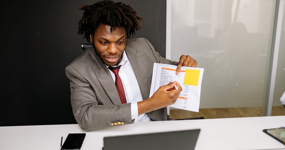 a man breaks down the data of each option of starting or buying a dental practice